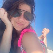 Amy Duggar ignores family modesty rules as she shares passionate kiss with  husband Dillon King after sexy swimsuit photo