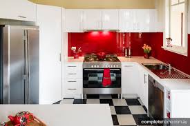 a retro kitchen with bright red