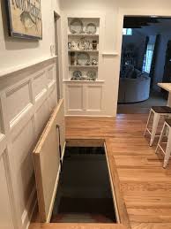 It probably isn't just getting in around. Trap Door Down To The Basement With A Pressure Lift For Ease Basement Doors Basement Stairs Trap Door
