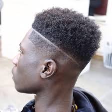 Try using different patterns for your braids to add uniqueness to your bun. 22 Haircuts For Black Men Hairstyle Man