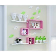 They could fit a lot of points and works as nightstands, this is a great concept even for the tiny bed room, and also they are in the same design. Wall Storage Shelves Pink Cube Wooden Kitchen Modern Bedroom