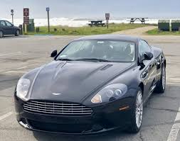 Image result for Jet Black 2011 Aston Martin