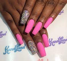 If you file the nails to a point sharp enough to draw blood, it's a compelling fashion choice that tempers the sweet, girly glitter. Matte Pink Nails With Diamonds Matte