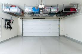 Great Traditional Garage With High Ceiling By Blanca Tezanos Garage Ceiling Storage Garage Organisation Overhead Garage Storage