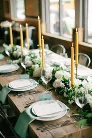 We Love This Green Themed Long Rustic Dinner Table Everything From The Gold Taper Candles And Cand Wedding Table Themes Green Themed Wedding Mustard Wedding