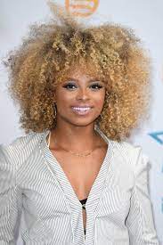 21 Celebrity Afros To Swoon Over This Season Blonde Afro Celebrity Hairstyles Female Celebrity Crush