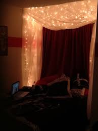 Lighted Bed Canopy I Used 3 Strings Of Icicle Lights With The White Cord And At Walmart They Have Window Shaws That Are Abou Home Home Decor Bedroom Decor