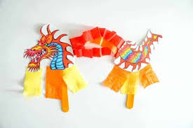 There's also absolutely nothing wrong with playing with this one on any other day! Chinese Dragon Puppet Kids Craft With Printable Dragon Template