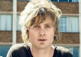 Kevin Mitchell eclipsed by his sidekick Bob Evans