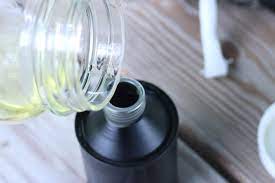 Diy Tiki Torch Fuel For Mosquitoes Everything Pretty Tiki Torches Diy Citronella Torch Diy Citronella