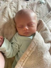 Happy birthday to my favorite son. (I only have one) believe it or not he  was the first baby born of the new year in our area. We got our picture in