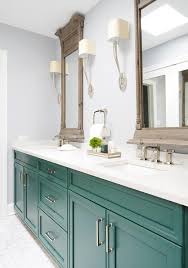 What is the price range for green bathroom vanities? Emerald Green Dual Bath Vanity With Vintage French Wood Mirrors Transitional Bathroom