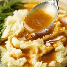 A Pile Of Mashed Potatoes On A Plate With A Spoon Drizzling Brown Gravy On Top Brown Gravy Recipe Gravy Recipes Homemade Brown Gravy