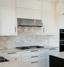 Creating a backsplash out of pastel tiles is a really great way to add a little subtle color into a white kitchen without it being over the top. Before After Caulfield Kitchen Contemporary Kitchen Vancouver By Christine Austin Design Houzz