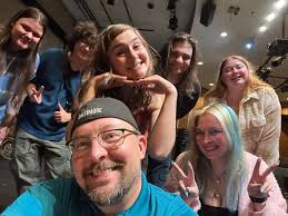 Behind the Scenes! Our Cast is diligently working