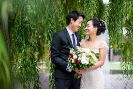 In the heart of the city, the conservatory is a truly tropical oasis and one of the most visually striking locations for a wedding reception.&nbsp; Ironmongers Hall Wedding Photography And Portraits At The Barbican