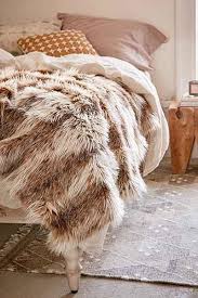 Sport luxe cozy teddy faux fur oversized throws. Faux Fur Brown And Ivory Throw Blanket