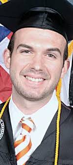 Tuck graduates with history degree
