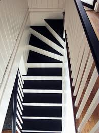 A fresh coat of paint can transform your staircase without a lot of money. Remodelaholic Black And White Painted Staircase Transformation