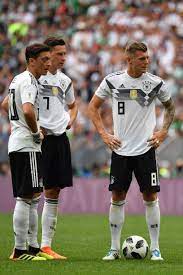 Germany S Midfielder Mesut Ozil Germany S Forward Julian Draxler And Julian Draxler Germany National Football Team Germany Football