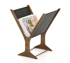 Made from vegan leather, this choice is also suitable for animal lovers! Brass Faux Leather Magazine Rack Pottery Barn