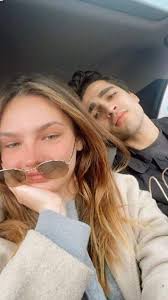 Mert and Afra had celebrated the new year's eve together with Afra's  friends 🤍 📌Mert in blue denim and beside him sits Afra in her black  dress🫦(Picture from 31st Dec,2024) Picture shared