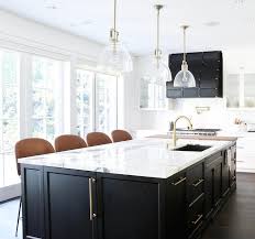 Maybe you would like to learn more about one of these? Black Oak Island With Sink And Gold Gooseneck Faucet Contemporary Kitchen