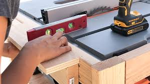Cut out table saw shelf supports. Diy Table Saw Stand With Folding Outfeed Table Plans And Video