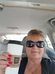 Sitting at Java Dave's in Tulsa near 15th and Sheridan. Drinking a toffee  flavored blend While CCR is