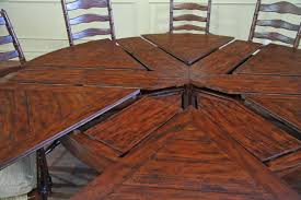 A simple rectangle of glass over a polished wood sawhorse. Walnut Jupe Table Theodore Alexander Cb54001 Sylvan Dining Table