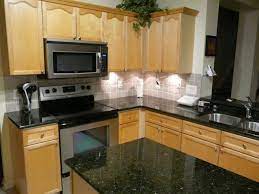 Colors of uba tuba granite. Cabinets And Counter Tops Will Look Something Like This With The Glass Tile Back Granite Countertops Uba Tuba Granite Countertops Cost Of Granite Countertops