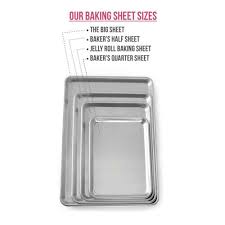 This is to stop your cookies (biscuits in nz) from sliding off the back when they again the sides stop your cookies falling off while they are being removed from the oven. Nordic Ware Baker S Quarter Sheet Aluminum Walmart Com Walmart Com