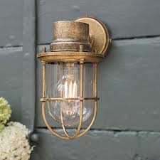 Wrap the ground wire once or twice around the threading of the ground bolt near the head, then tighten the ground bolt to secure. Outdoor Lighting Garden Wall Lights Hand Finished In Uk Jim Lawrence