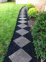 A walkway is a great addition to your garden that is sure to enhance your outdoor landscaping and allow you to get more enjoyment from your yard. 30 Lawn Edging Designs For You To Pick Mulch Landscaping Diy Landscaping Landscape With Mulch