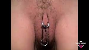 nippleringlover kinky DIY piercing inner labia and pulling pussyrings  through them very old movie - XNXX.COM