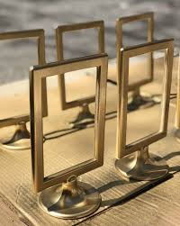 Diy Gold Table Number Holders Using 0 99 Ikea Tolsby Frames Angelahums Gold Table Number Holders Gold Table Numbers Wedding Table Number Holders