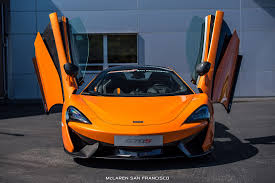 Ventura Orange Mclaren 570s Coupe By Mso Front View Doors Up Sssupersports Com Super Cars Mclaren 570s Mclaren