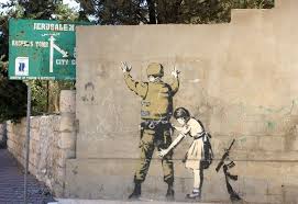 Banksy street art on the entrance to the aida refugee camp in bethlehem, as seen on april 18, 2019. Banksy Street Art Love Banksy Art Political Art