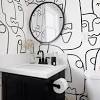 And i love the addition of the brass pendant wall lights and brass circular mirror. 3