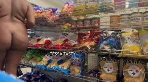 Naked ebony plays with banana in corner store - ThisVid.com