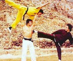 Bruce lee and jackie chan in a scene from enter the dragon. Jackie Chan Fan Account On Twitter Jackie Chan Bolo Yeung And Bruce Lee Rehearsing On The Set Of Enter The Dragon Brucelee Jackiechan Legend Houseoftaboo Https T Co Awh5fcrdqg