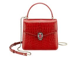 A pleated mini skirt is a cute way to get the mini. Serpenti Forever Crossbody Bag 286931 Bvlgari