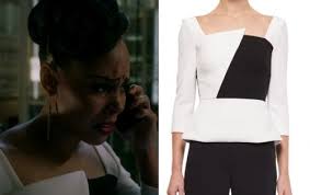 Tegan's white puff-shoulder top and red leopard skirt