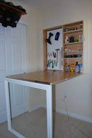 Wall Mounted Media Storage Cabinet Ideas On Foter Craft Table Diy Craft Cabinet Fold Down Table