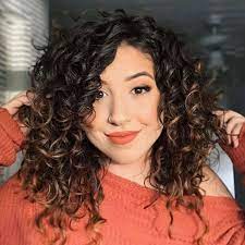 Another way to style long curly hair is to go for side bangs: 21 Best Side Swept Bangs 2021 Ideas Pictures