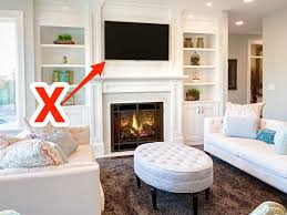 A cosy fire surrounded by warm colors will comfort and relax you. Interior Designers Reveal The Mistakes You Re Making In A Living Room