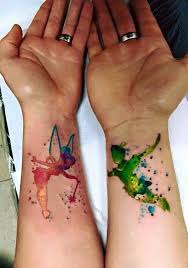 Tinker Bell And Peter Pan Color Ink Tattoo Tattoo Ideen Tatowierungen Im Partnerlook Feen Tattoo