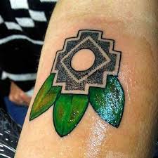 This is another great example of a landscape tattoo and we love how it reaches on the outside of the circle. Meguel