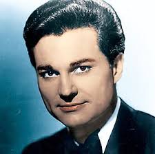 Leroy Frank Van Dyke (born October 4, 1929) is an American country music  and honky-tonk singer and guitarist, best known for his hits "The  Auctioneer" (1956) and "Walk