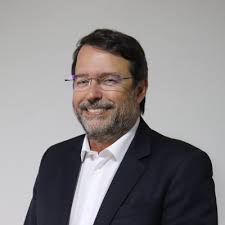 Brian McCrory, atual presidente do Conselho Mundial das Cooperativas de  Crédito (Woccu), e Manfred Dasenbrock, Board member da entidade. Propagando  a doutrina do cooperativismo financeiro sob a ótica…